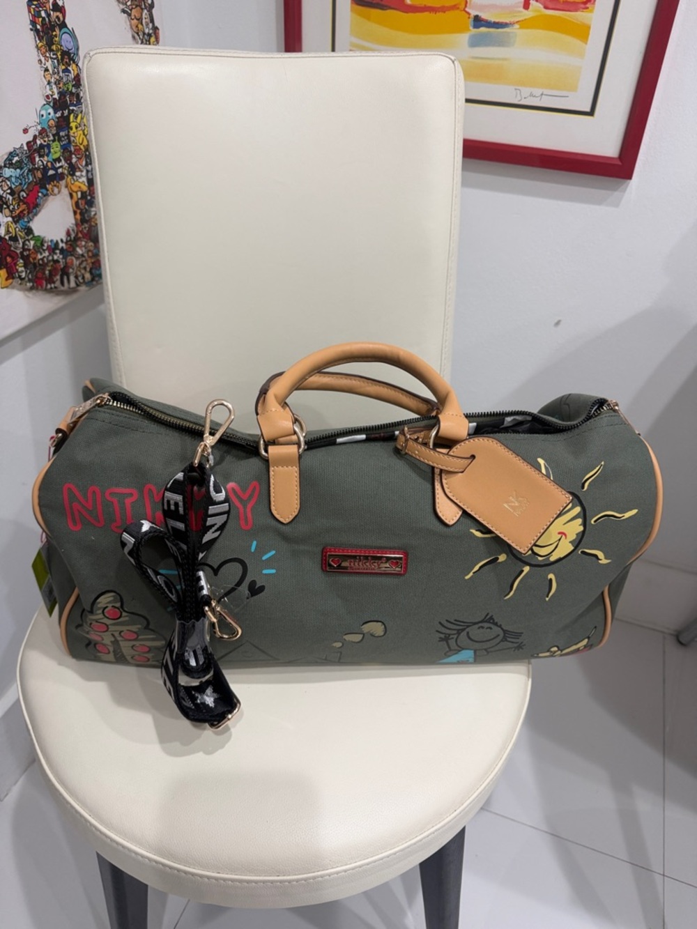 Nicole Lee Olive Canvas Travel Weekender with Tan Trim and Playful Graphics